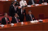 Xi Jinping looks as Ex-Chinese Prez led out from the Great Hall