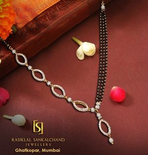 one side chain and one side black moti mangalsutra