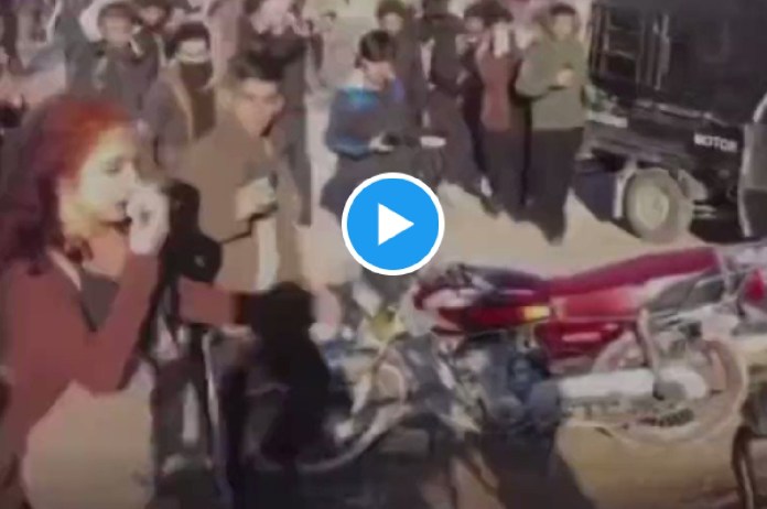 Video: Men kick teen for 'distracting' riders with her short in Iraq