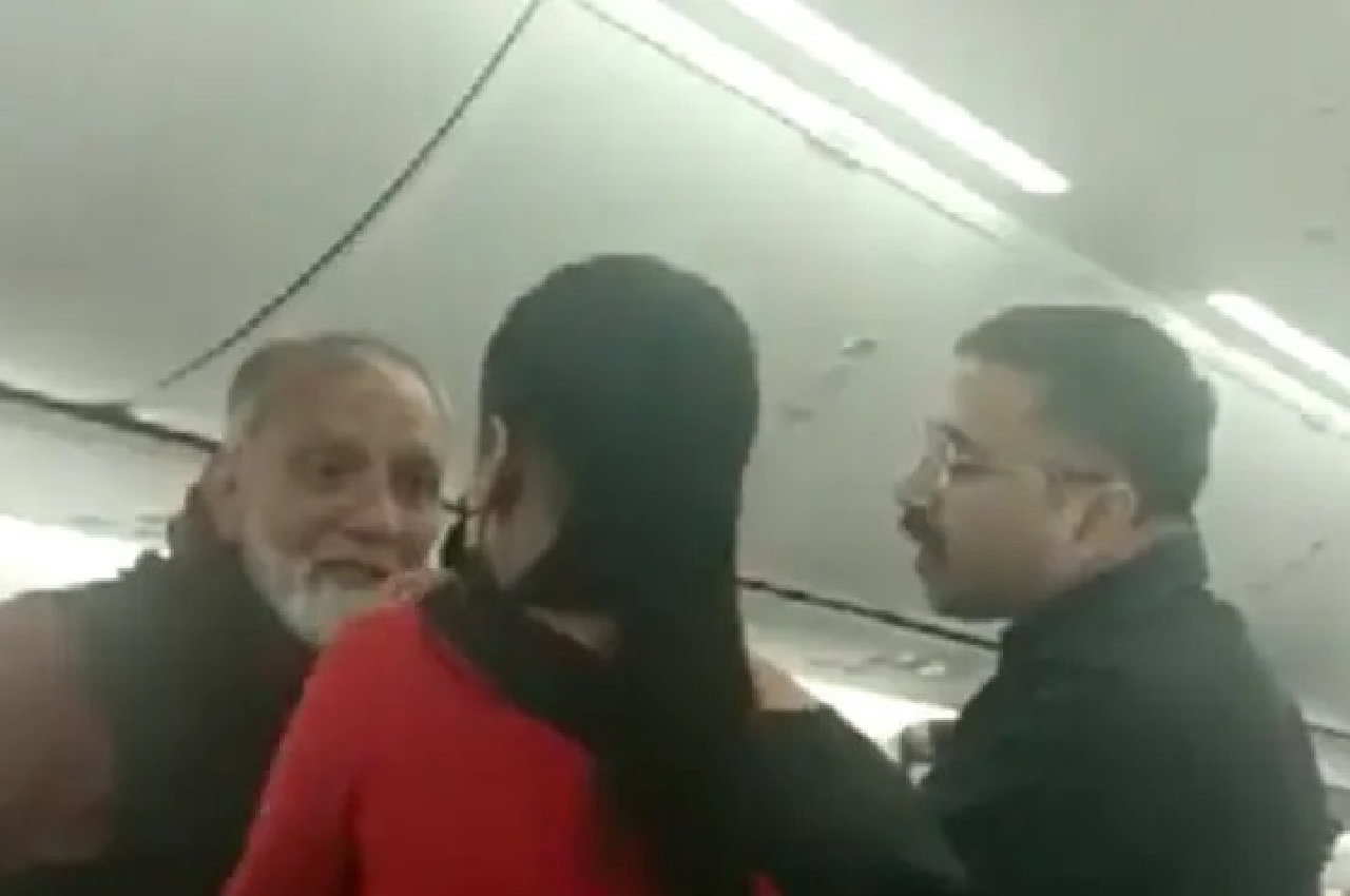 viral video elderly male passenger misbehave with air hostage