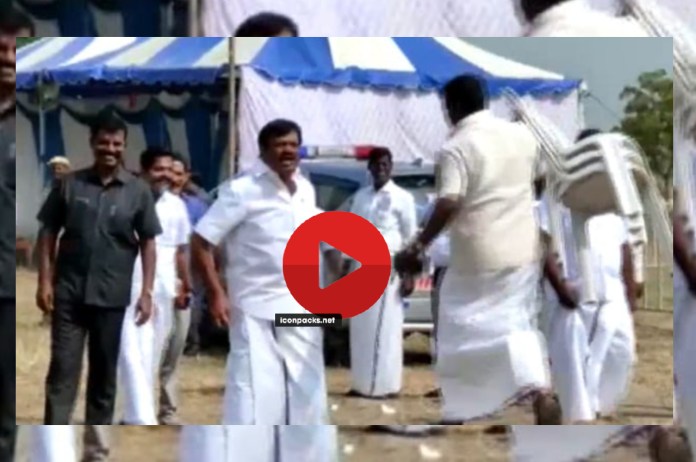 Tamil Nadu Minister throwing stone on party worker