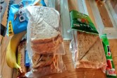 Woman pack extra lunch for son's friend