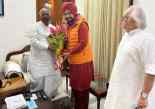 Navjot meets kharge