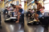 man taking bath inside subway coach