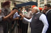 PM Modi warmly welcomed by Indian diaspora in Paris with selfies, slogans, and songs