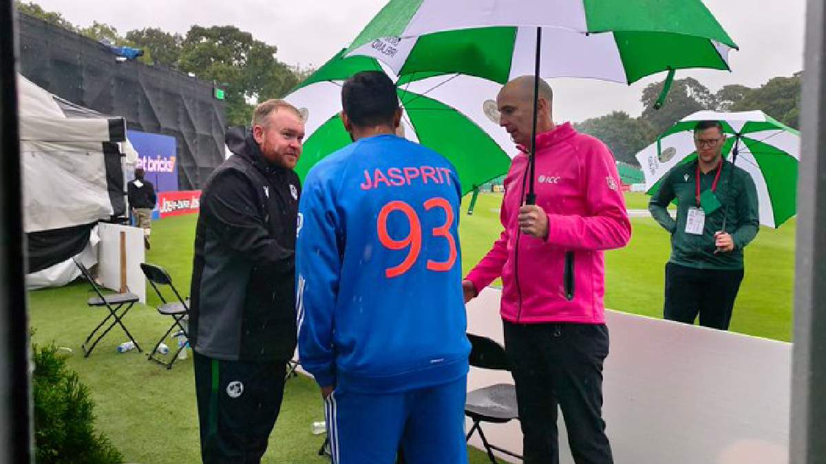 Jasprit Bumrah shakes hand with Andrew Balbirnie as the game ends due to rain. (Photo credit: X/BCCI)