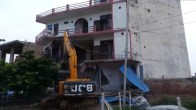 Bulldozer action on illegal "Sahara Family Restaurant"