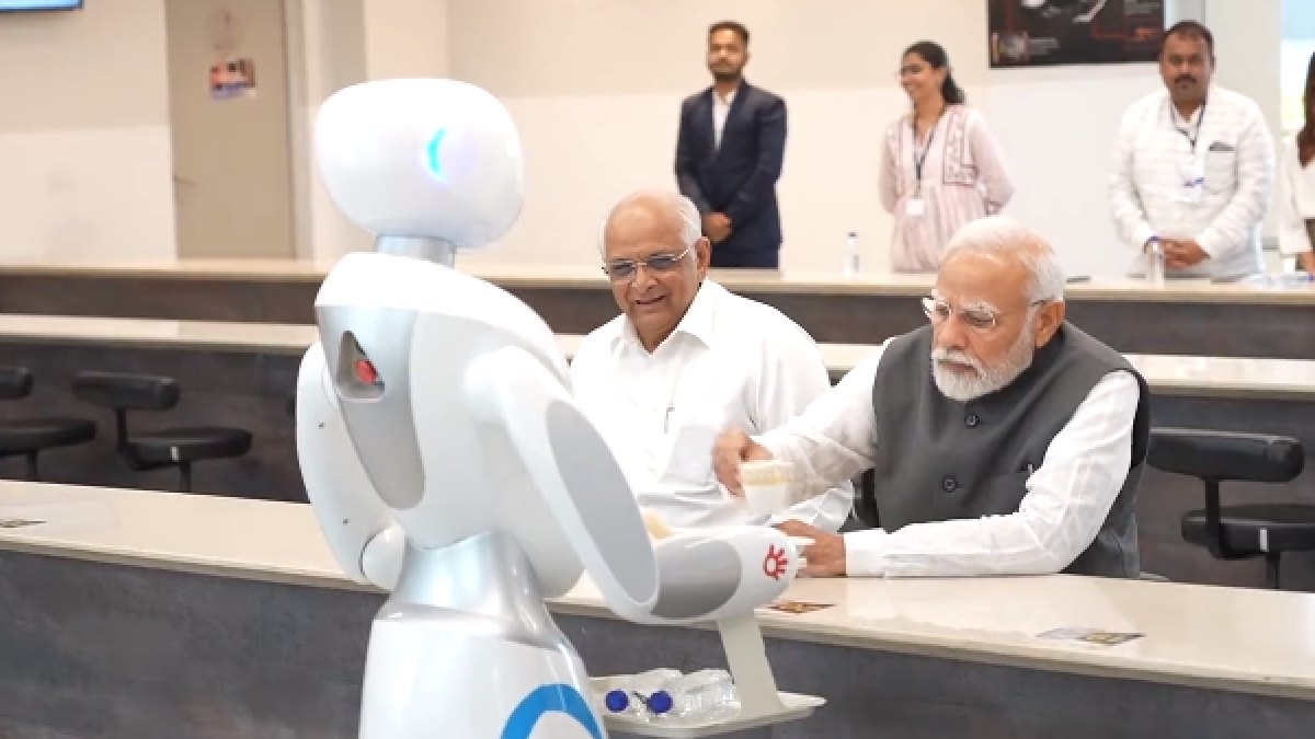 Robot serving tea to PM Modi (Photo Credits: X/NarendraModi)