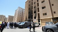 Kuwait Fire, Woman Searching For Her Son