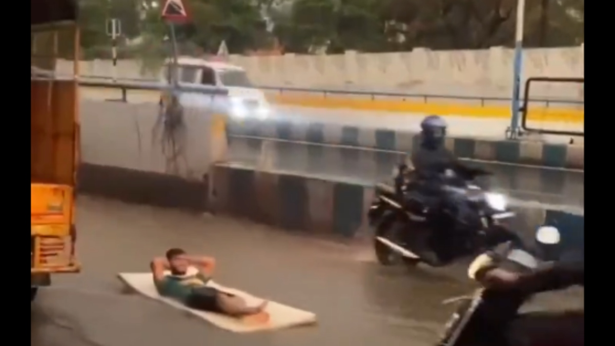 Pune Man Surfing On Waterlogged Road