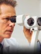 Ophthalmologist examining a patient's eyes