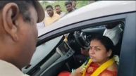 A viral video shows Andhra Pradesh minister's wife Haritha Reddy reprimanding a police officer, sparking controversy.