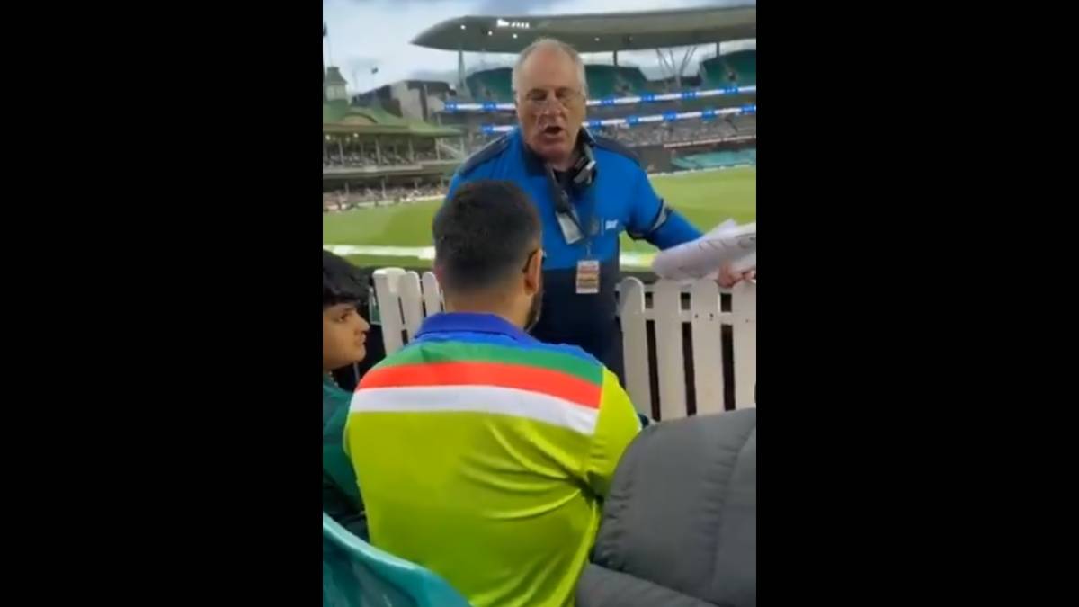 The Pakistani fan being reprimanded