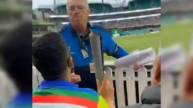 The Pakistani fan being reprimanded