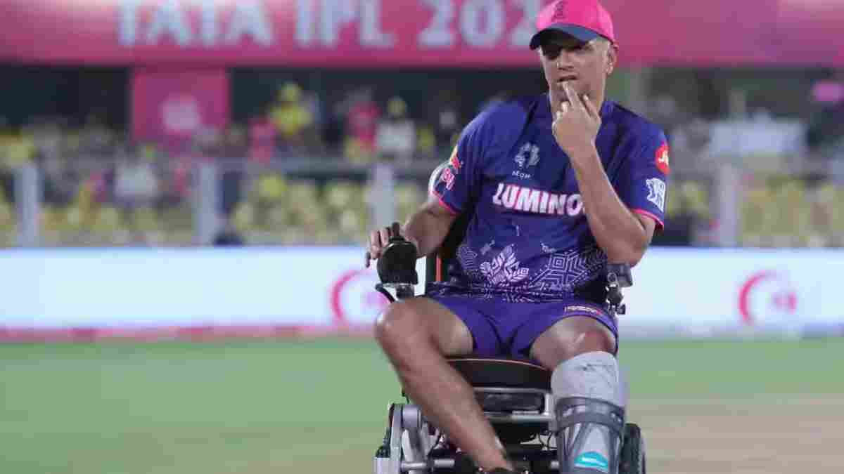 Rahul Dravid inspects pitch on wheelchair