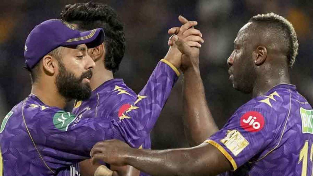 Varun Chakravarthy and Andre Russell