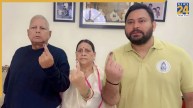 Lalu Prasad Yadav, the former chief minister of Bihar, votes in Patna with his family.